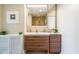 Bright bathroom with a modern vanity, sleek countertop, and a spacious shower area at 1101 Juniper Ne St # 612, Atlanta, GA 30309