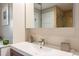 Stylish bathroom featuring a modern sink, vanity, and shower with glass enclosure at 1101 Juniper Ne St # 612, Atlanta, GA 30309