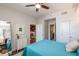 Comfortable bedroom with hardwood floors, white trim, and connecting doorways at 1101 Juniper Ne St # 612, Atlanta, GA 30309