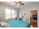 Cozy bedroom boasts hardwood floors, a ceiling fan, and bright natural light at 1101 Juniper Ne St # 612, Atlanta, GA 30309