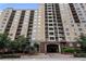 Multi-story condominium building with multiple windows and brick and stucco facade at 1101 Juniper Ne St # 612, Atlanta, GA 30309