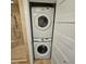 Convenient stacked washer and dryer located next to the tiled shower at 1101 Juniper Ne St # 612, Atlanta, GA 30309
