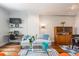 Bright living room features hardwood floors, a modern desk, and a comfortable sofa for relaxing at 1101 Juniper Ne St # 612, Atlanta, GA 30309