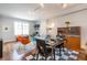 Open living area featuring dining set, modern furnishings, and lots of natural light at 1101 Juniper Ne St # 612, Atlanta, GA 30309