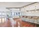 A bright, modern lobby with stylish seating, dark wood floors, and a bar area with pendant lighting at 1101 Juniper Ne St # 612, Atlanta, GA 30309