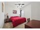 Cozy bedroom featuring a ceiling fan, neutral walls, and carpeted floors for added comfort at 2220 Stirling Bridge Rd, Cumming, GA 30041