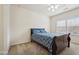 Relaxing bedroom with soft natural light and neutral walls at 2220 Stirling Bridge Rd, Cumming, GA 30041