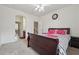 Inviting bedroom with soft carpet, neutral paint, and bright natural light at 2220 Stirling Bridge Rd, Cumming, GA 30041