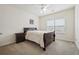 Comfortable bedroom featuring bright natural light, plush carpet, and neutral paint at 2220 Stirling Bridge Rd, Cumming, GA 30041