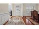 Inviting foyer with hardwood floors, view of the living space and dining room table at 2220 Stirling Bridge Rd, Cumming, GA 30041