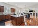 Spacious kitchen featuring granite counters, ample cabinet space, and stainless steel appliances at 2220 Stirling Bridge Rd, Cumming, GA 30041
