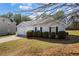 Inviting one-story home with a well-manicured lawn and attached two-car garage at 4419 White Rd, Douglasville, GA 30135