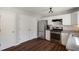 Well-equipped kitchen with stainless steel appliances, white cabinets, and granite countertops at 4419 White Rd, Douglasville, GA 30135