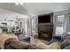 Spacious living area with fireplace, TV, open to kitchen, and comfortable seating at 4419 White Rd, Douglasville, GA 30135