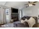 Cozy living room featuring a fireplace, large TV, and vaulted ceilings at 4419 White Rd, Douglasville, GA 30135