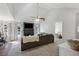 Open-concept living space with fireplace, kitchen view, and comfortable seating at 4419 White Rd, Douglasville, GA 30135