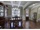 Formal dining room with coffered ceilings, hardwood floors, and ample natural light at 115 Dorys Way, Dallas, GA 30157