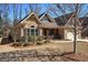 Charming home with a stone and siding exterior, manicured landscaping, and a two-car garage at 115 Dorys Way, Dallas, GA 30157