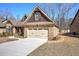 Home with a 2-car garage and stone accents at 115 Dorys Way, Dallas, GA 30157
