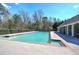 Community pool with a spacious deck and comfortable lounge chairs for residents at 115 Dorys Way, Dallas, GA 30157