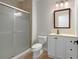 Bathroom with a walk-in shower, a white vanity, and tile flooring at 1196 Yellow River Dr, Lawrenceville, GA 30043