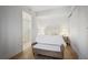 Cozy bedroom with neutral tones, a comfortable bed, and an ensuite bathroom at 1820 Peachtree Nw St # 303, Atlanta, GA 30309