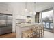 Modern kitchen featuring stainless steel Viking appliances, granite countertops, and pendant lighting at 1820 Peachtree Nw St # 303, Atlanta, GA 30309