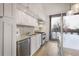 Bright, contemporary kitchen with stainless appliances, sleek cabinetry and natural light at 1820 Peachtree Nw St # 303, Atlanta, GA 30309