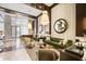 Grand lobby space featuring comfortable seating, elegant lighting, and decorative mirrors at 1820 Peachtree Nw St # 303, Atlanta, GA 30309