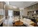 Bright and airy lounge featuring a fireplace, bar, and comfortable seating at 1820 Peachtree Nw St # 303, Atlanta, GA 30309