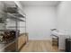 Well-lit storage room with shelving, providing ample space for organization and storage at 1820 Peachtree Nw St # 303, Atlanta, GA 30309