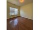 Bright bedroom with natural light and hardwood floors at 257 Brookview Dr, Riverdale, GA 30274
