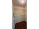 A small closet has wood floors and wire shelving at 257 Brookview Dr, Riverdale, GA 30274