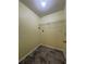 A small closet has gray floors and wire shelving at 257 Brookview Dr, Riverdale, GA 30274