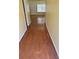 Long hallway with hardwood flooring leading to other areas of the home at 257 Brookview Dr, Riverdale, GA 30274