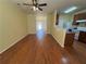Open-concept living room leading to the kitchen, perfect for entertaining at 257 Brookview Dr, Riverdale, GA 30274