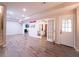 Finished basement with new flooring, French doors, and ample living space at 507 Autumn Walk, Canton, GA 30114