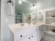 Bright bathroom showcasing a double vanity with a large mirror and open storage at 507 Autumn Walk, Canton, GA 30114