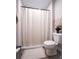 Bathroom showcasing a shower/tub combination, toilet, and neutral color scheme at 507 Autumn Walk, Canton, GA 30114