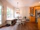 Charming breakfast nook with built-in bench seating and natural light from large windows at 507 Autumn Walk, Canton, GA 30114
