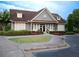 Well-maintained clubhouse with lush landscaping and inviting entrance at 507 Autumn Walk, Canton, GA 30114