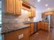 The spacious kitchen features stainless steel appliances and ample cabinet space at 507 Autumn Walk, Canton, GA 30114