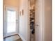 Walk-in pantry with ample shelving for storage, conveniently located near the back door at 507 Autumn Walk, Canton, GA 30114