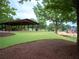 Landscaped park with a covered pavilion and playground at 507 Autumn Walk, Canton, GA 30114