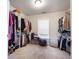 Organized walk-in closet with ample shelving and hanging space at 507 Autumn Walk, Canton, GA 30114