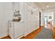 Hallway with hardwood floors and built-in storage cabinets, next to a countertop, and view to a room at 976 Blue Ridge Ne Ave, Atlanta, GA 30306