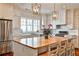 Bright, airy kitchen with white cabinets, stainless steel appliances, and large center island at 976 Blue Ridge Ne Ave, Atlanta, GA 30306