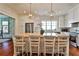 Bright eat-in kitchen features a large center island, stainless appliances, pendant lighting, and a butler's pantry at 976 Blue Ridge Ne Ave, Atlanta, GA 30306