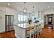 Bright, airy kitchen with white cabinets, stainless steel appliances, and large center island at 976 Blue Ridge Ne Ave, Atlanta, GA 30306