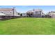 Expansive backyard with lush green lawn, offering ample space for recreation and outdoor activities at 10670 Day Lily Dr, Hampton, GA 30228